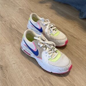Nike Kids White Sneakers with Blue Swoosh and Pink & Neon Green Accents Excee